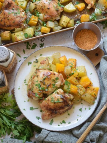 sheet-pan-chicken-and-squash-dinner-image Old bay chicken sheet pan dinner on a plate.