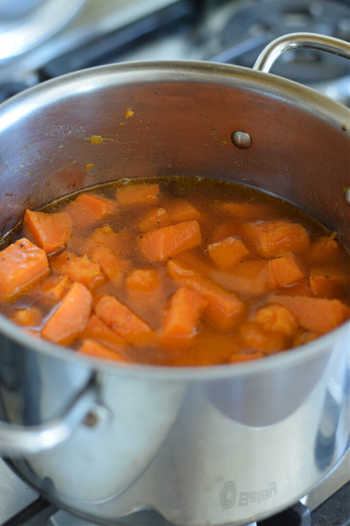 Cooking sweet potato soup in a pot.