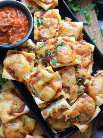 Pizza bites with pizza sauce.