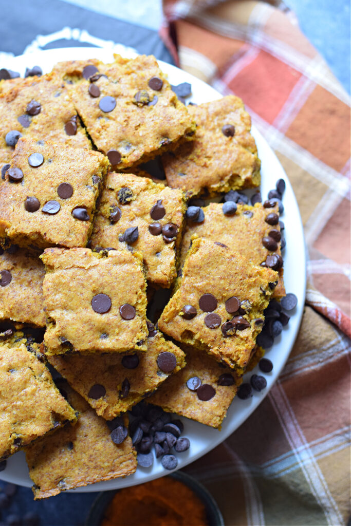 Pumpkin bars on a cookie tray.