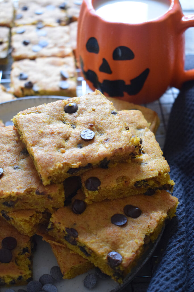 A stack of pumpkin chocolate chip cookie bars