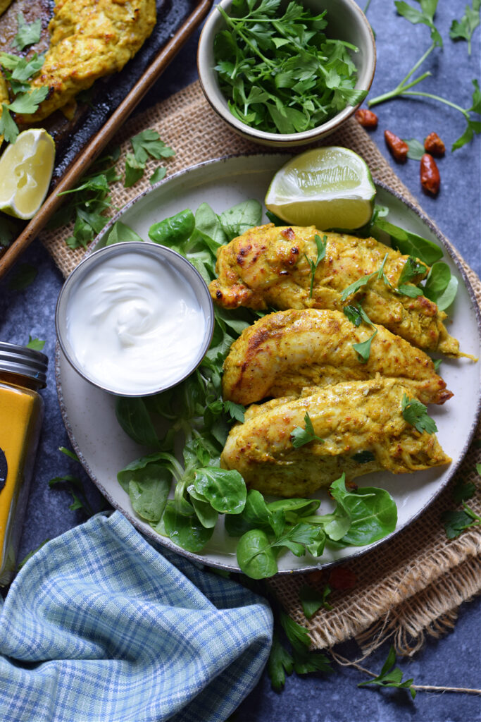 Spiced tandoori Chicken tenders on a plate.