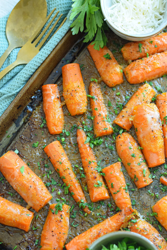 Parmesan roasted carrots on a tray.
