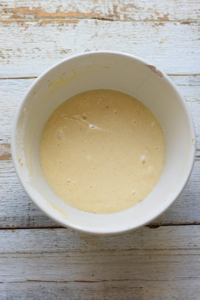 Cream cheese batter in a small bowl.