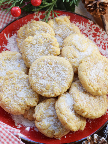 Chewy coconut cookies on a plate.