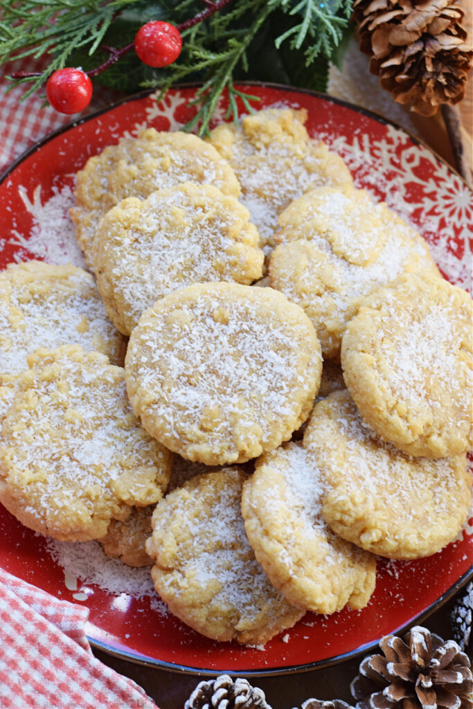 Chewy coconut cookies on a plate.