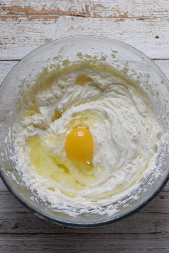 Add eggs to cream cheese mixture.