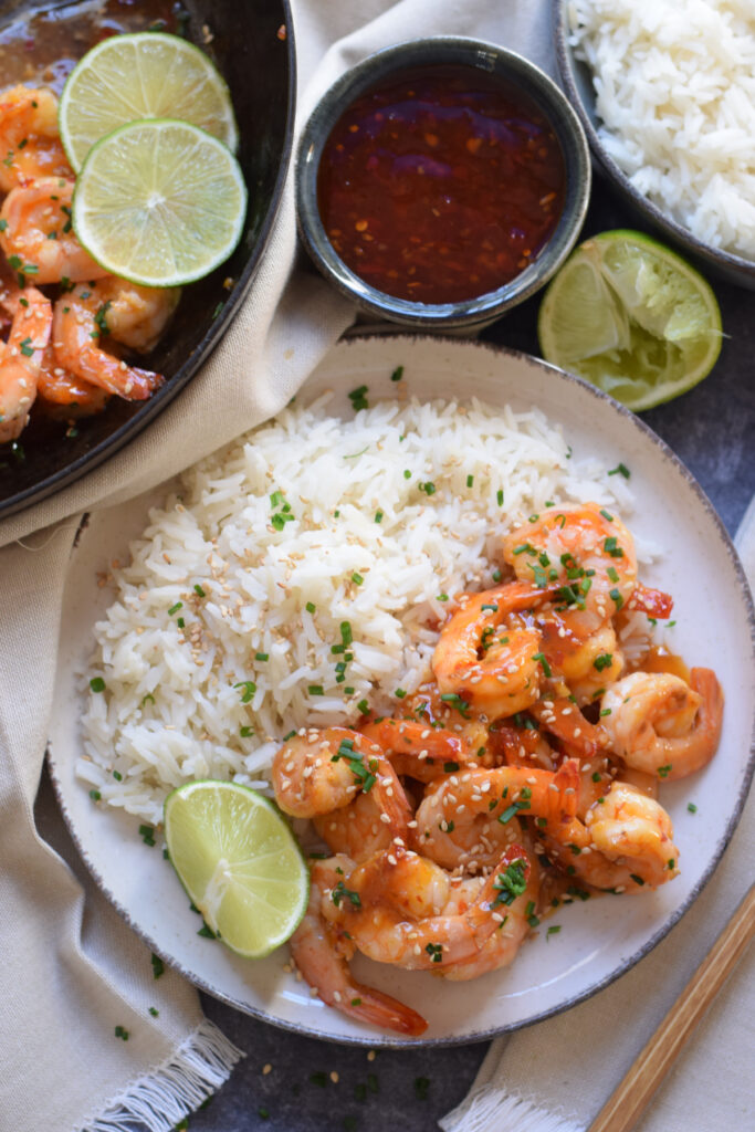 Spice things up with this quick and Easy Sweet Chili Shrimp Recipe.  Using just seven ingredients and in under 20 minutes you can have this on your dinner table.
