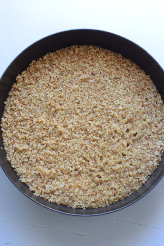 Cooked quinoa in a skillet.