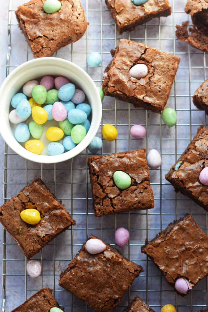 Easter egg brownies on a cooling rack.