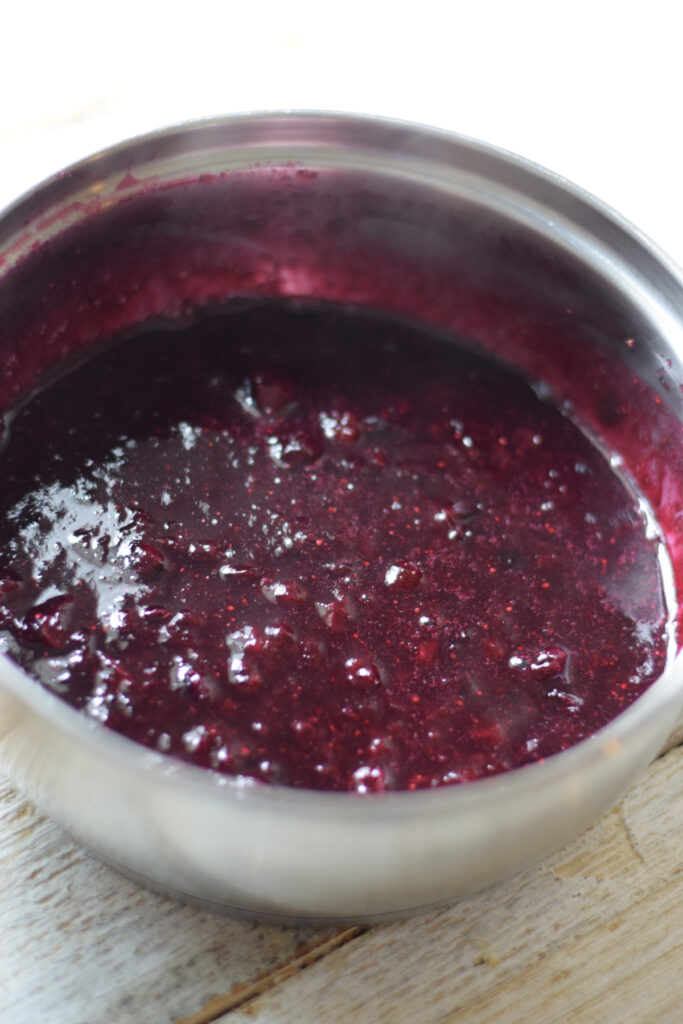 Blueberry compote in a saucepan.