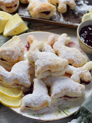 Lemon and blueberry filled puff pastry shapes.