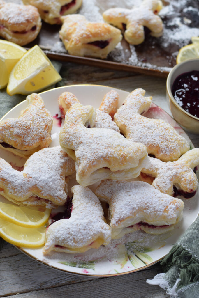 Lemon and blueberry filled puff pastry shapes.