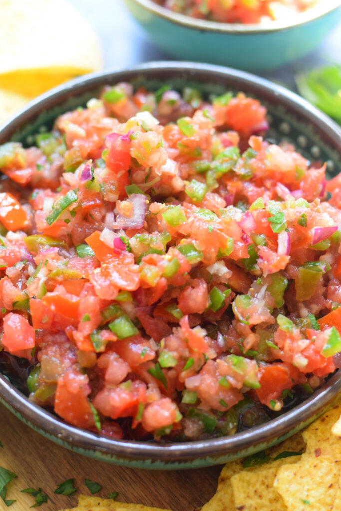 close up of salsa in a bowl.