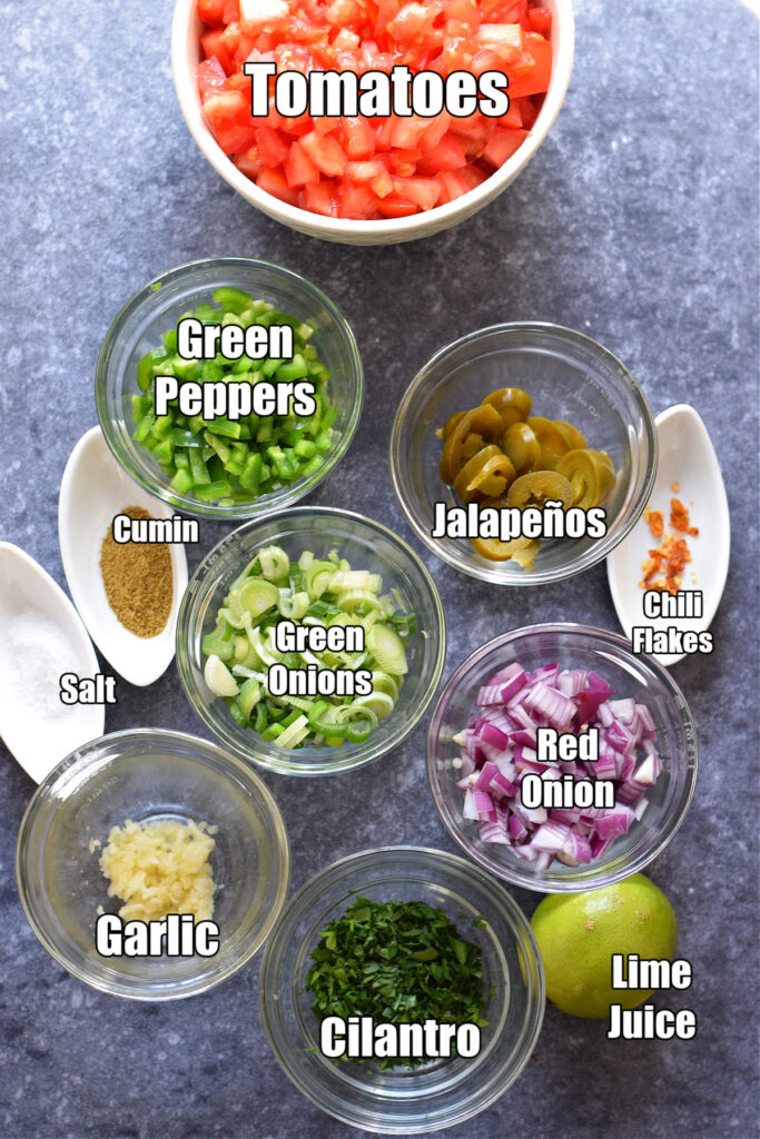 Ingredients ot make homemade spicy salsa.