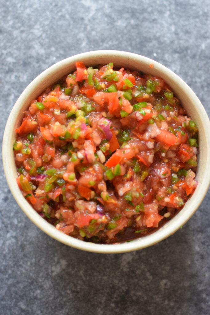 Homemade spicy salsa in a bowl.