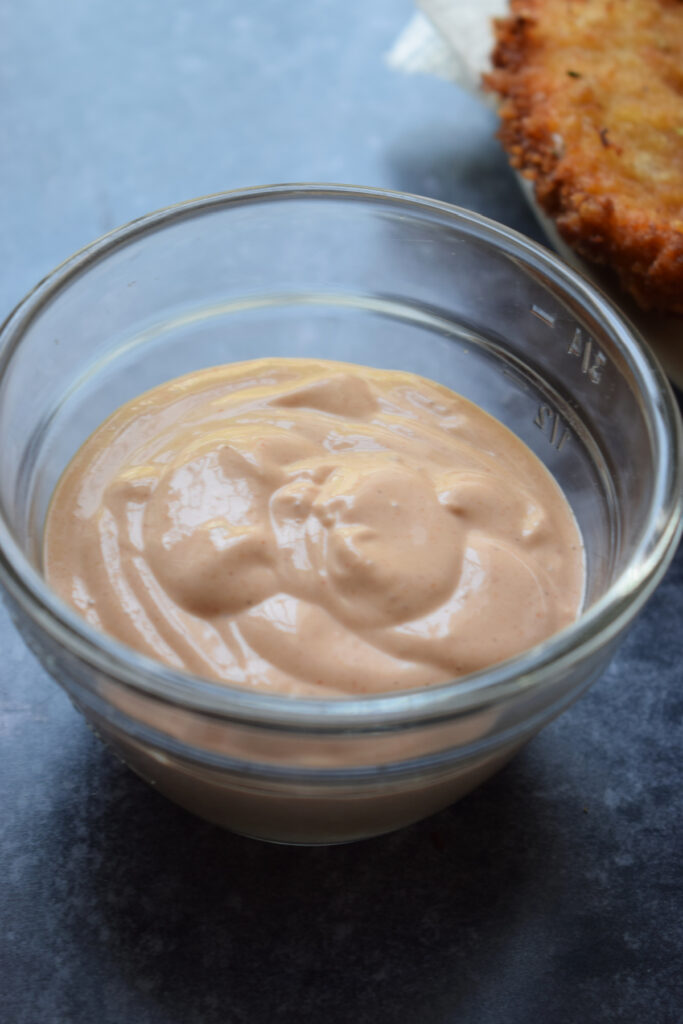 Dipping sauce in a glass bowl.