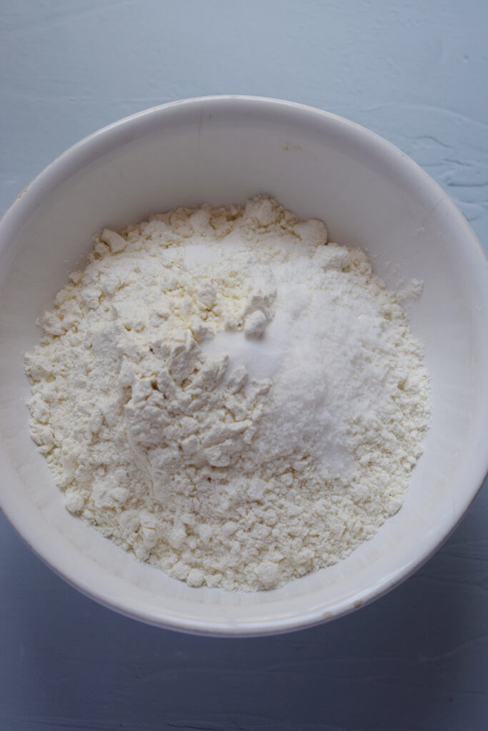 Flour and baking soda in a bowl.