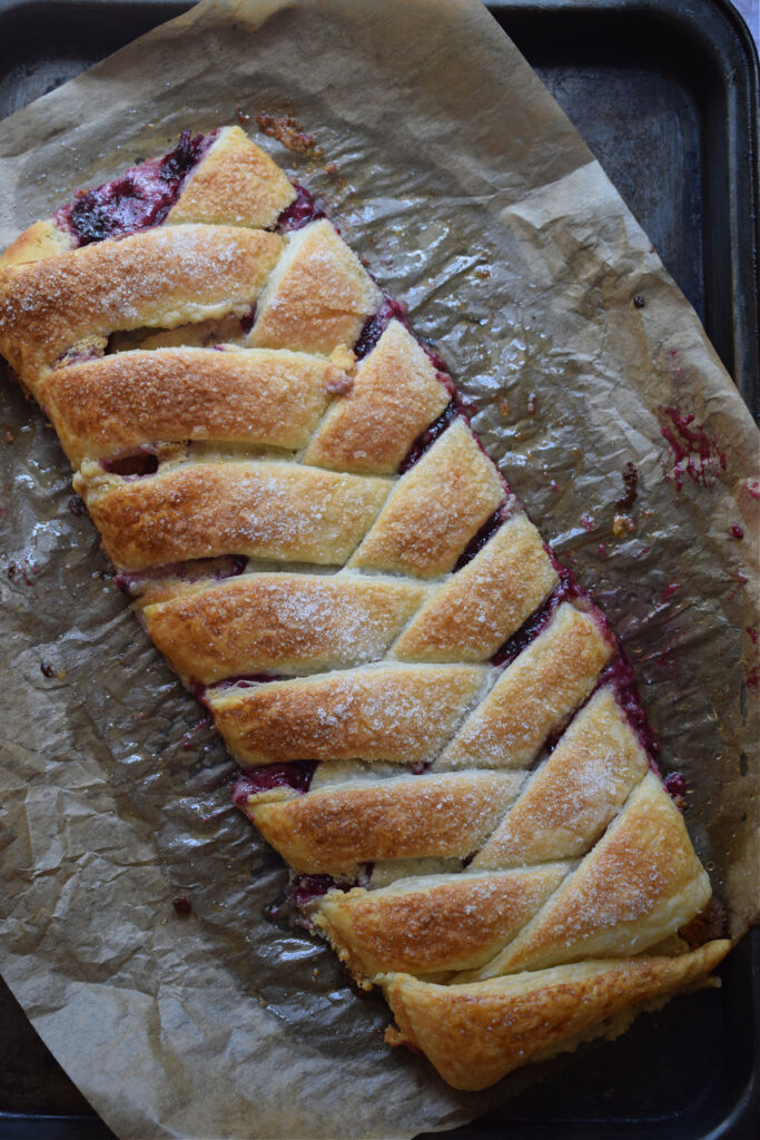 Berry Cream Cheese Danish on a baking tray.