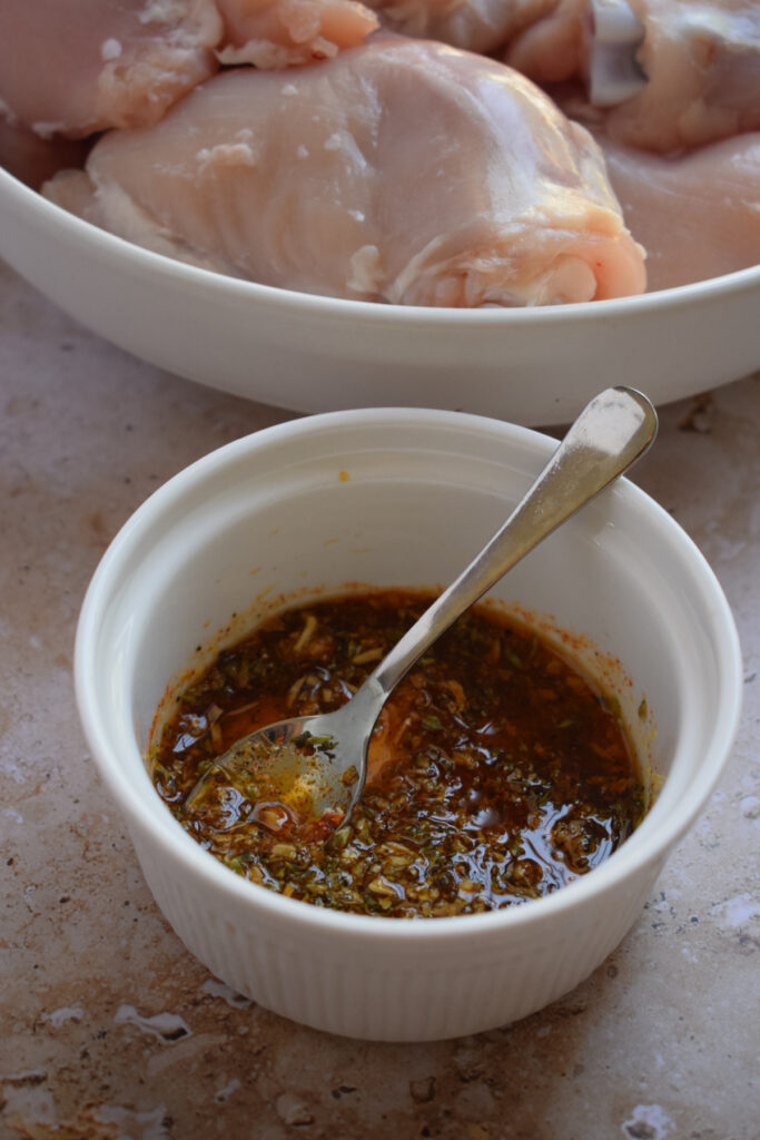 Spice seasoning in a bowl for baked chicken thighs.