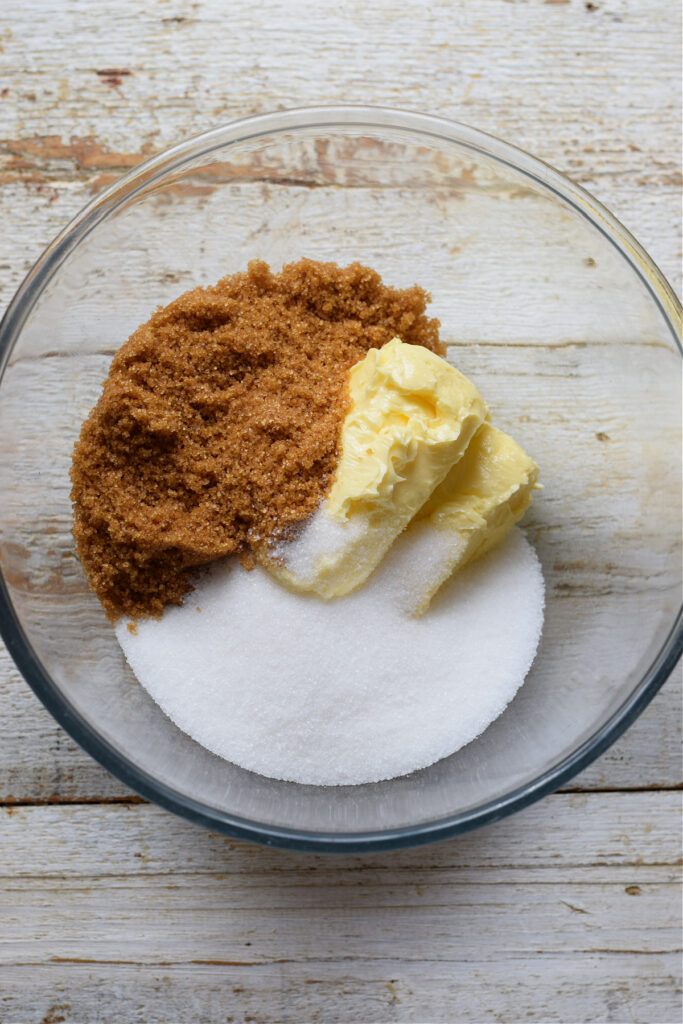 Sugar and butter in a glass bowl.