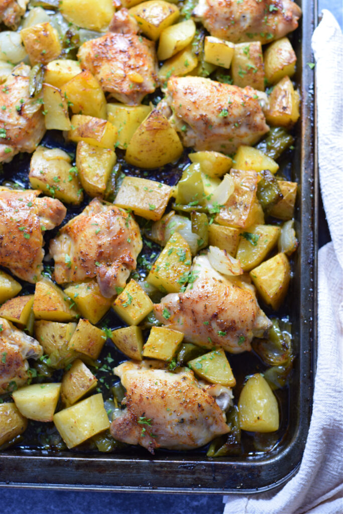 Sheet pan Cajun chicken on a tray.