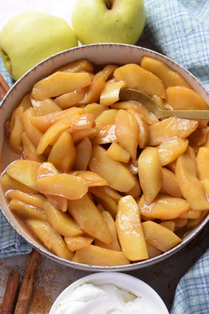 Caramelized apples in a bowl.