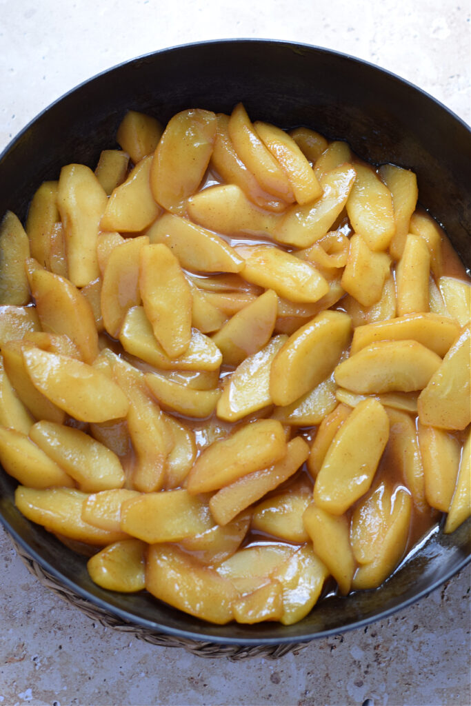 Caramelized apples in a skillet.