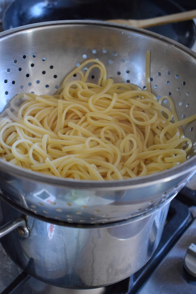 Pasta in a colander.