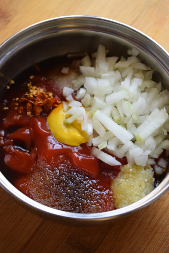 Barbecue sauce ingredients in a saucepan.