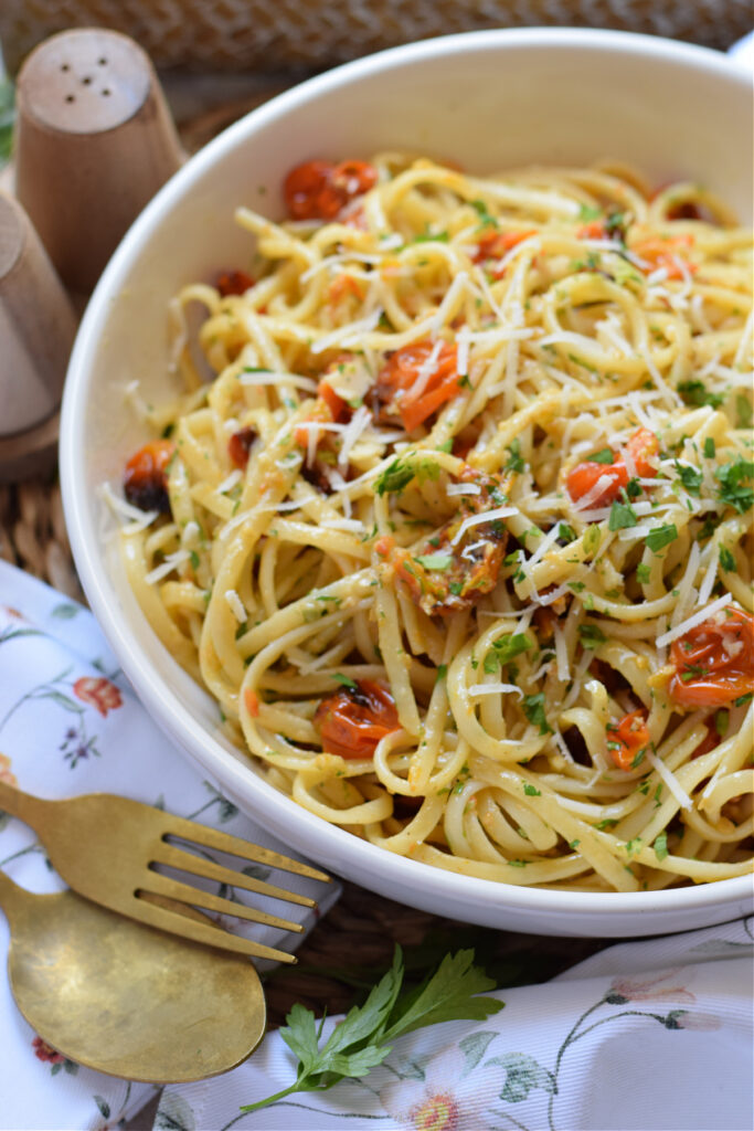 Close up of roasted cherry tomato pasta.