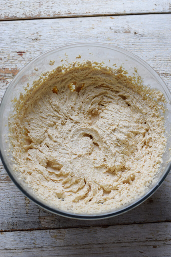 Mixed batter in a glass bowl.