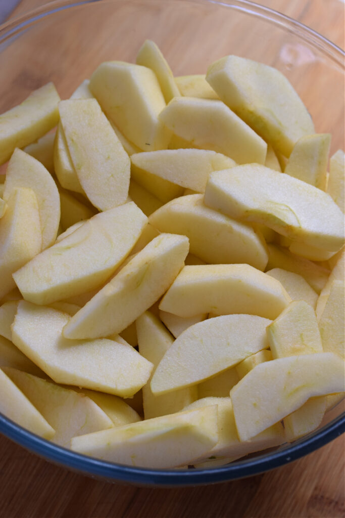 Apple slices in a small bowl.