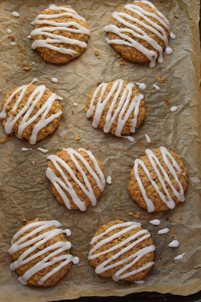 Carrot cake cookies on a cookie sheet.