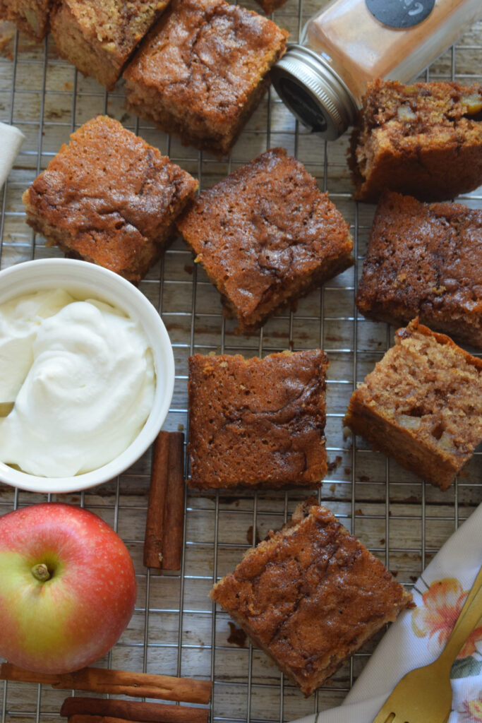 Apple cake squares on a tray.