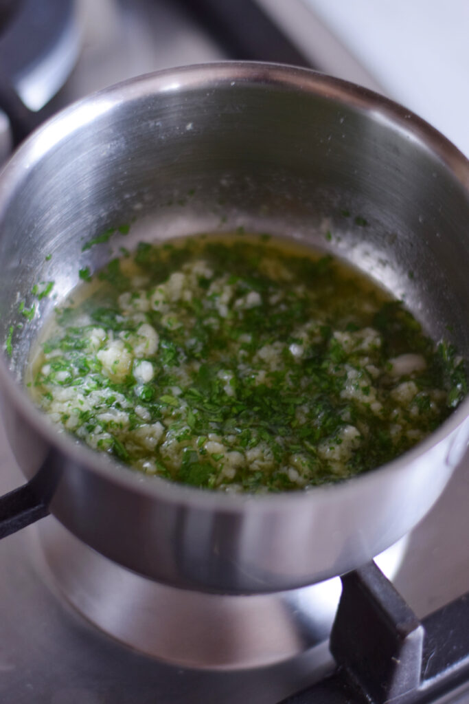 Garlic butter in a saucepan.