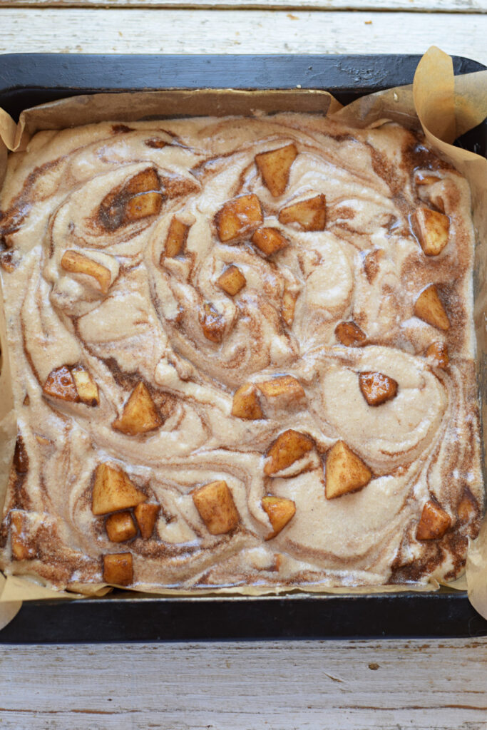 Apple cake squares ready to bake.