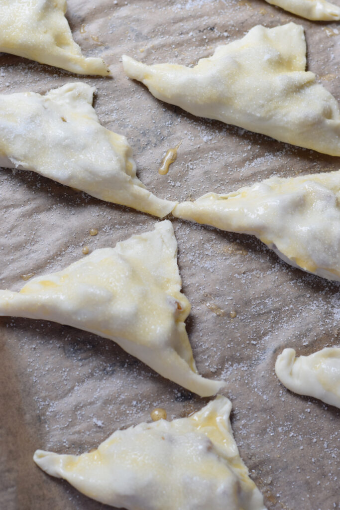 Turnovers brushed with whisked egg.