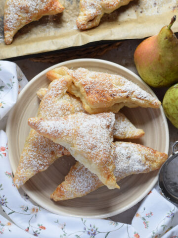 pear turnovers on a plate.