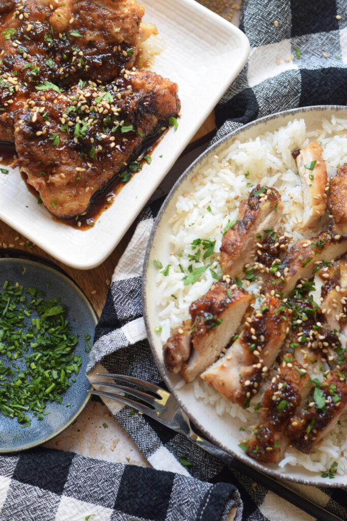 Soy garlic and ginger chicken on a serving plate.