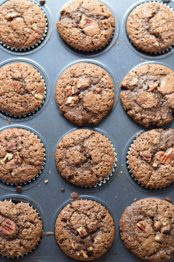 Baked muffins in a muffin tray.