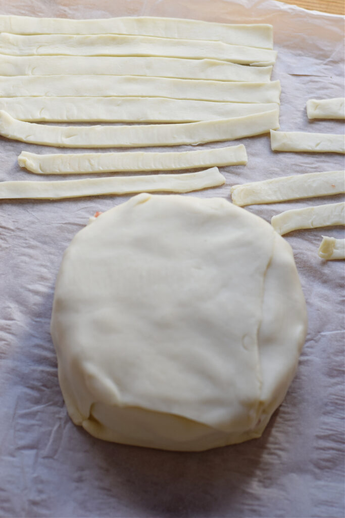 Brie cheese covered in puff pastry.