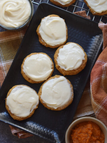 Pumpkin cookies with cream cheese frosting.