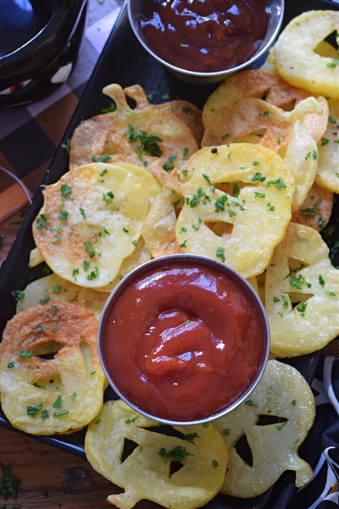 Halloween potato chips with ketchup.