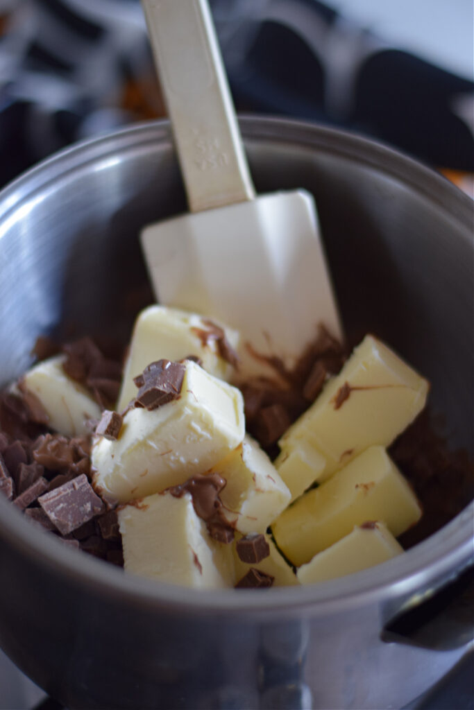 Melting butter and chocolate in a double boiler.