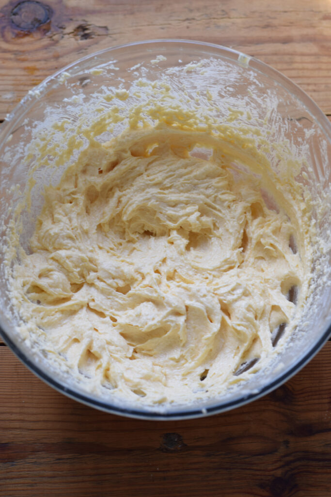 Making muffin batter in a glass bowl.