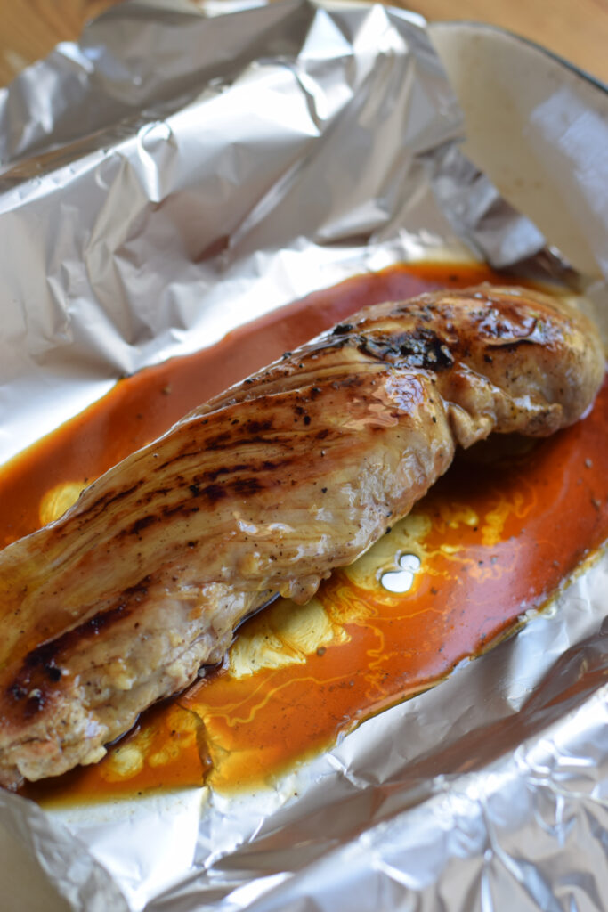 Pork tenderloin in tin foil.