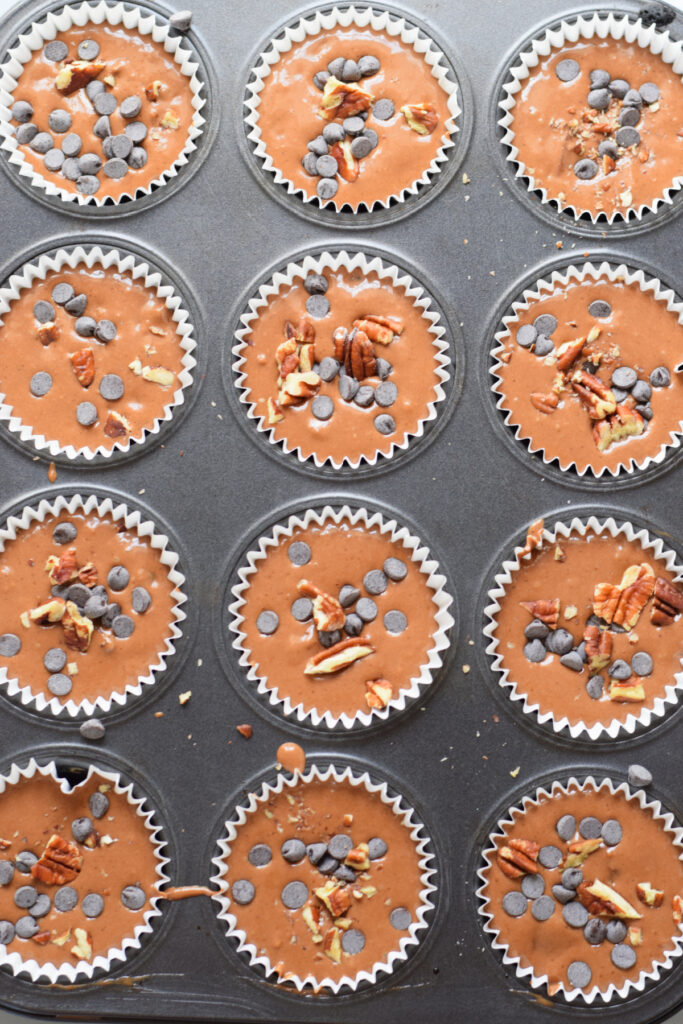 Ready to bake chocolate pecan muffins.