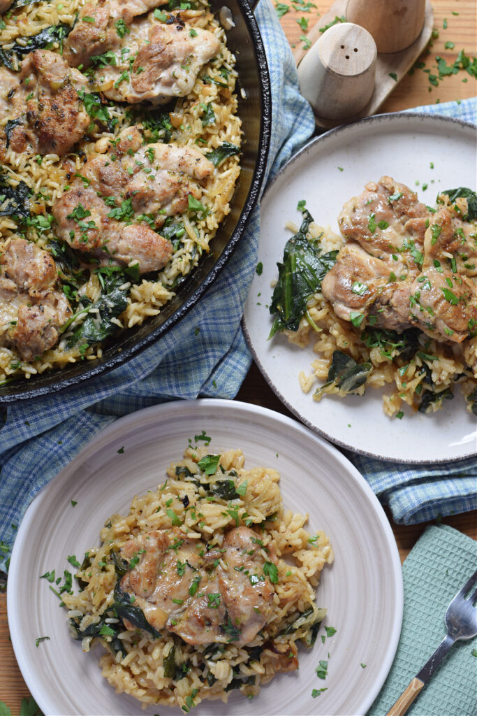 Chicken and rice on serving plates.