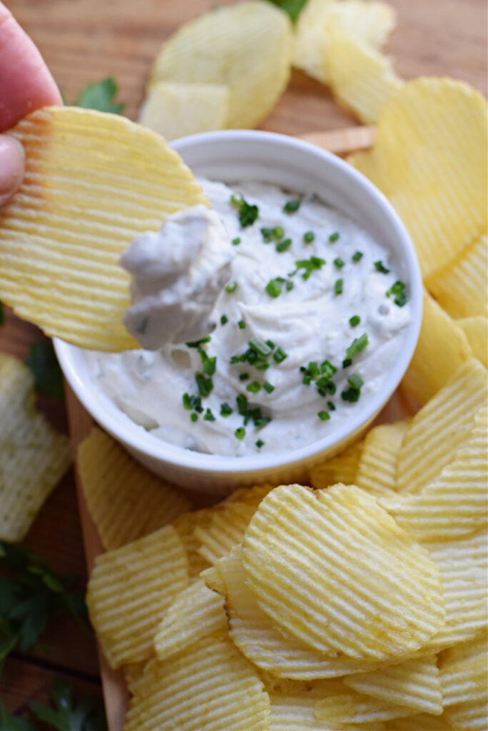 Dip in a bowl with chips.